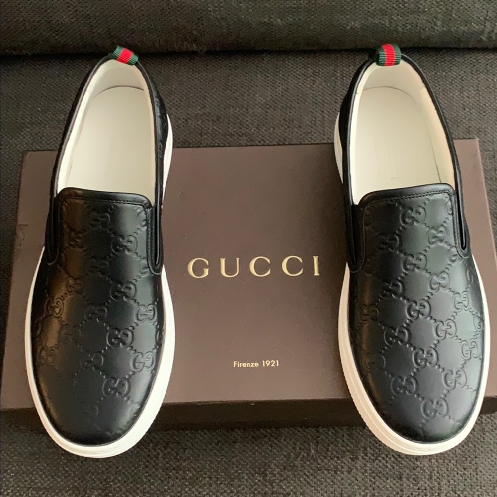 Brand New Gucci slip-ons color black size 7.5